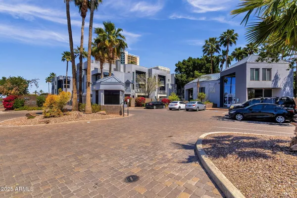a view of a street with cars