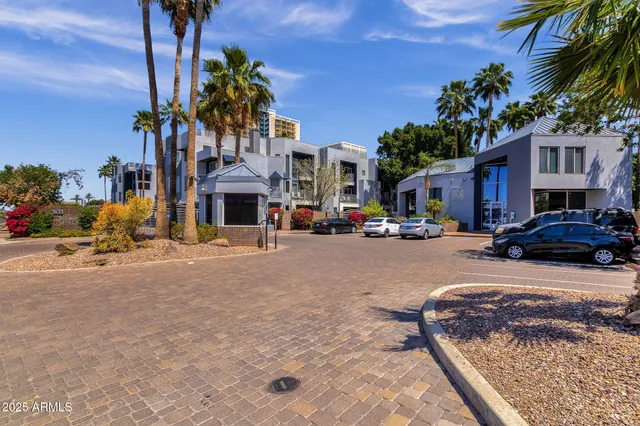 a view of a street with cars
