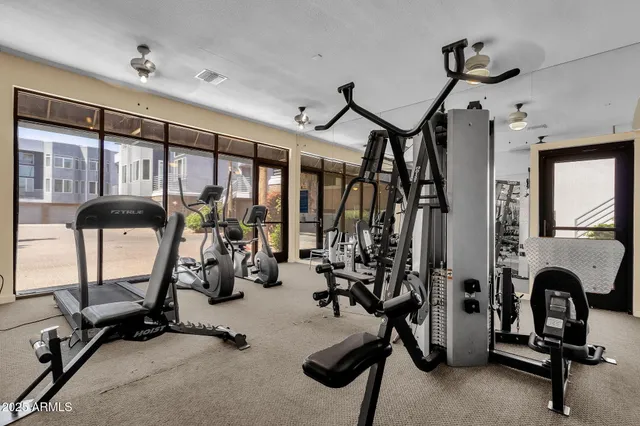 a view of a room with gym equipment
