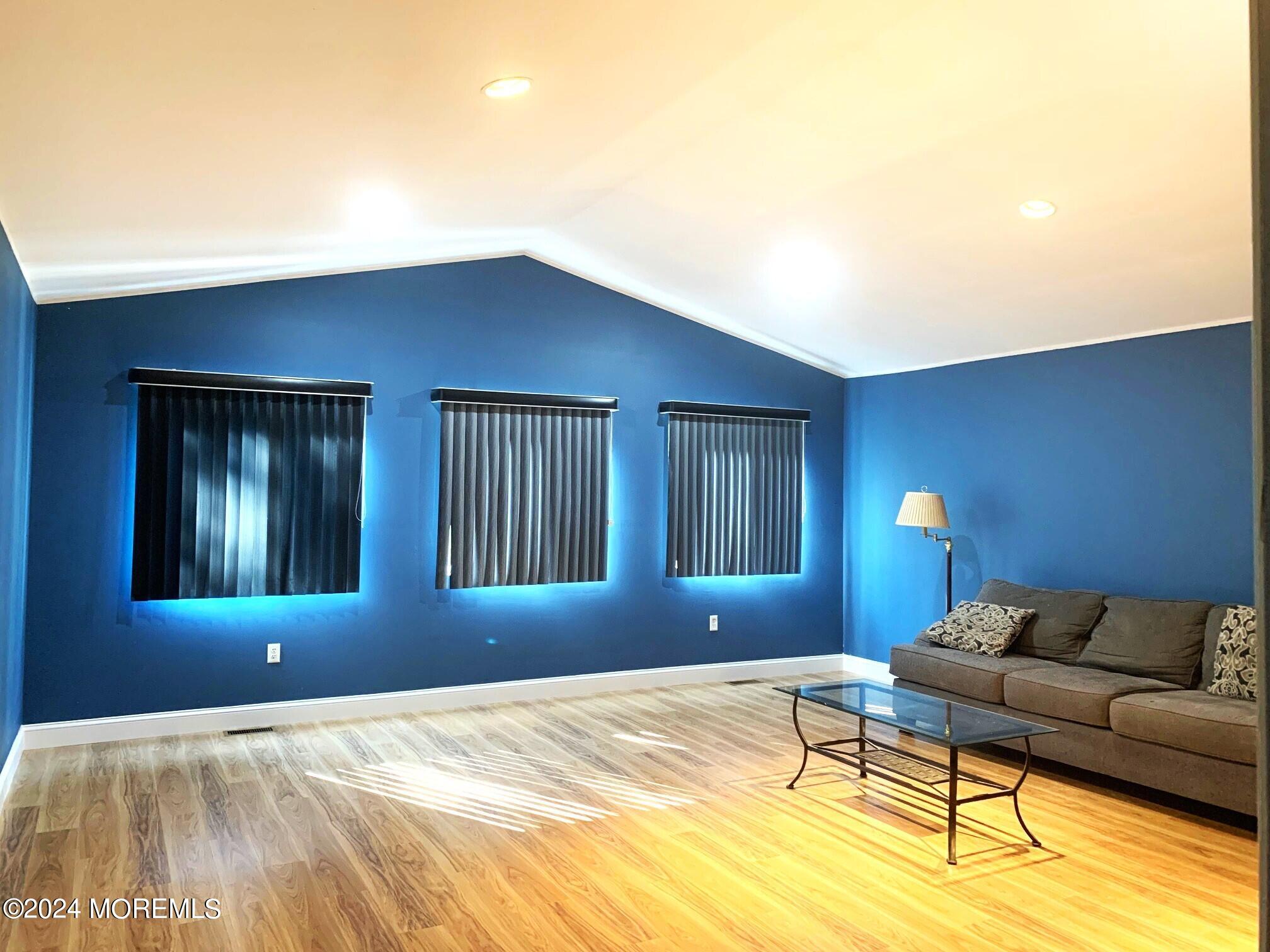 696 Wright Debow Road Jackson, NJ 08527 - Photo 11 of 31 a bedroom with a bed lamps and windows