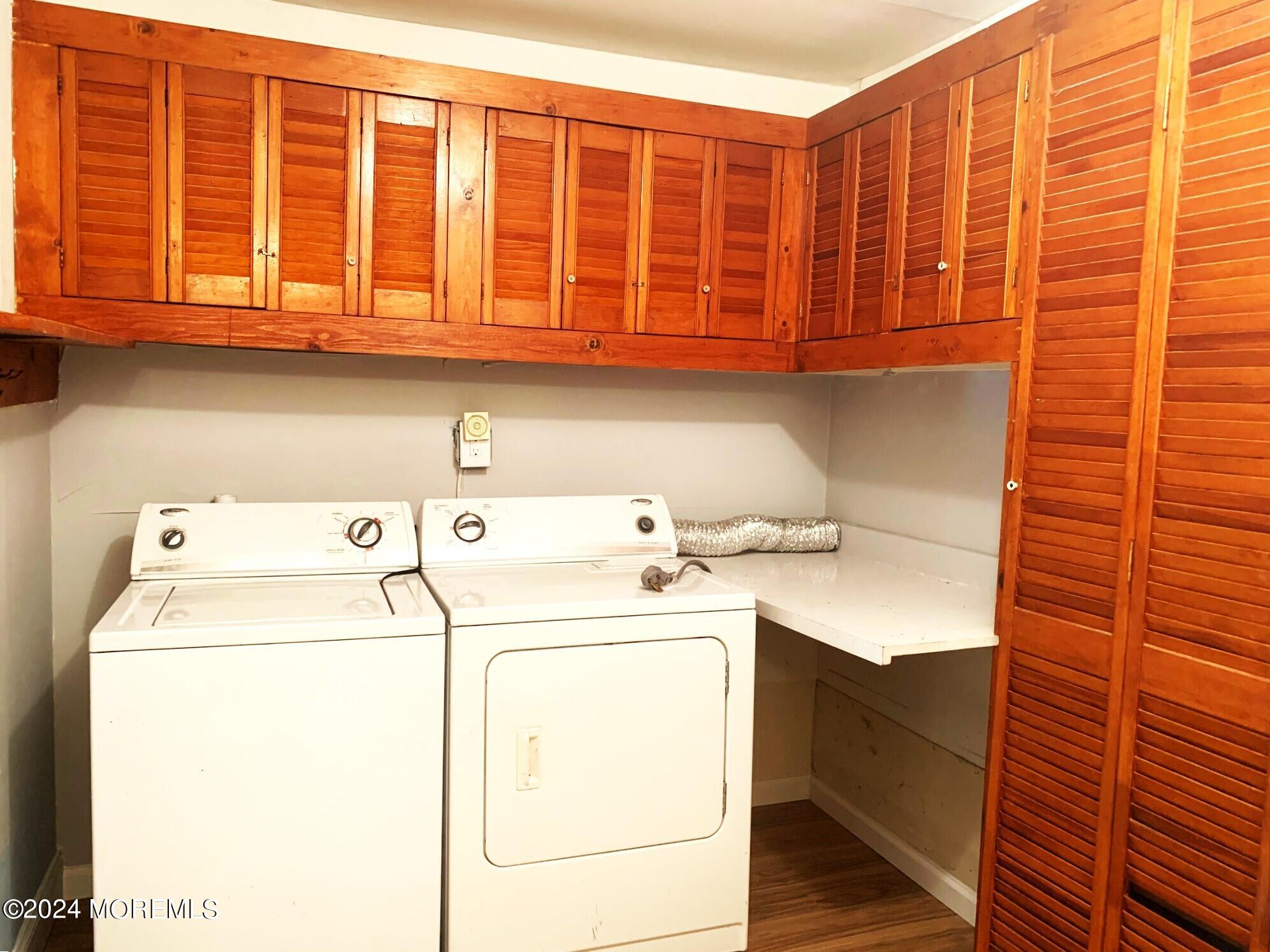696 Wright Debow Road Jackson, NJ 08527 - Photo 14 of 31 a utility room with dryer and washer