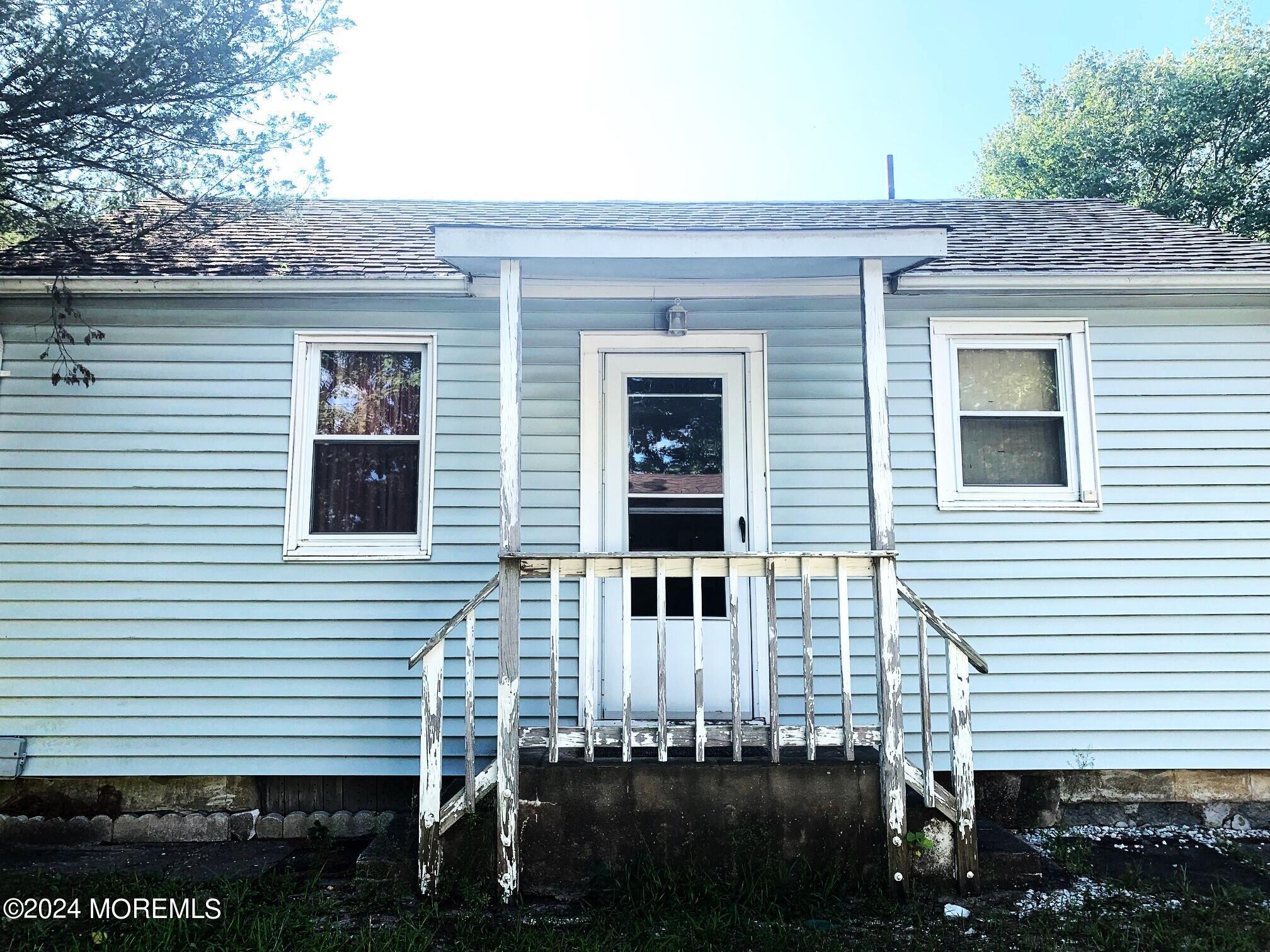 696 Wright Debow Road Jackson, NJ 08527 - Photo 17 of 31 a view of a house with a small yard