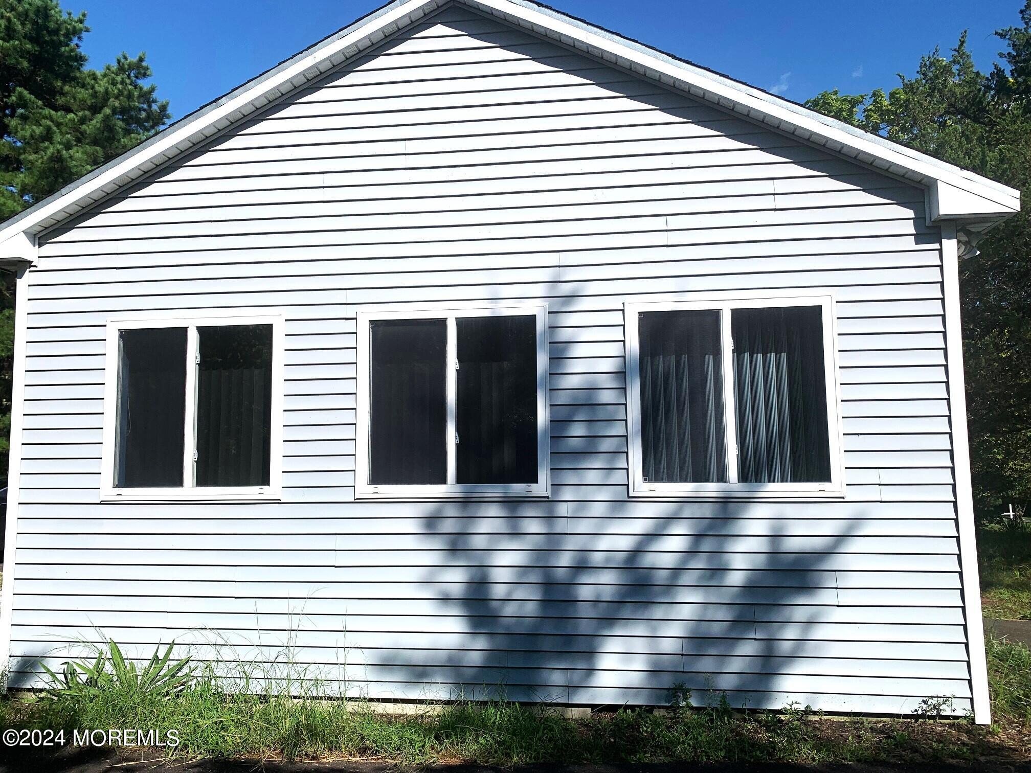 696 Wright Debow Road Jackson, NJ 08527 - Photo 30 of 31 a view of a white house