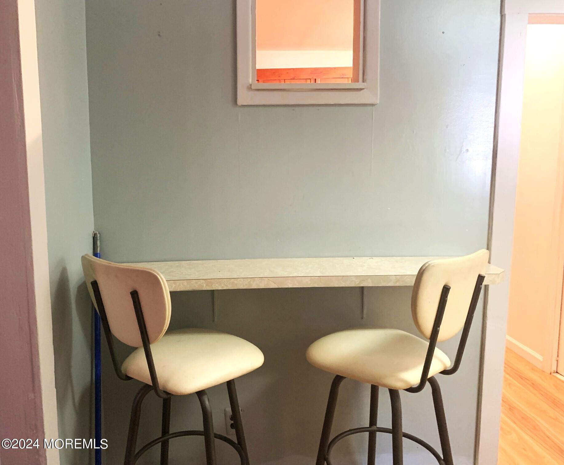 696 Wright Debow Road Jackson, NJ 08527 - Photo 7 of 31 a view of chairs and table in a room