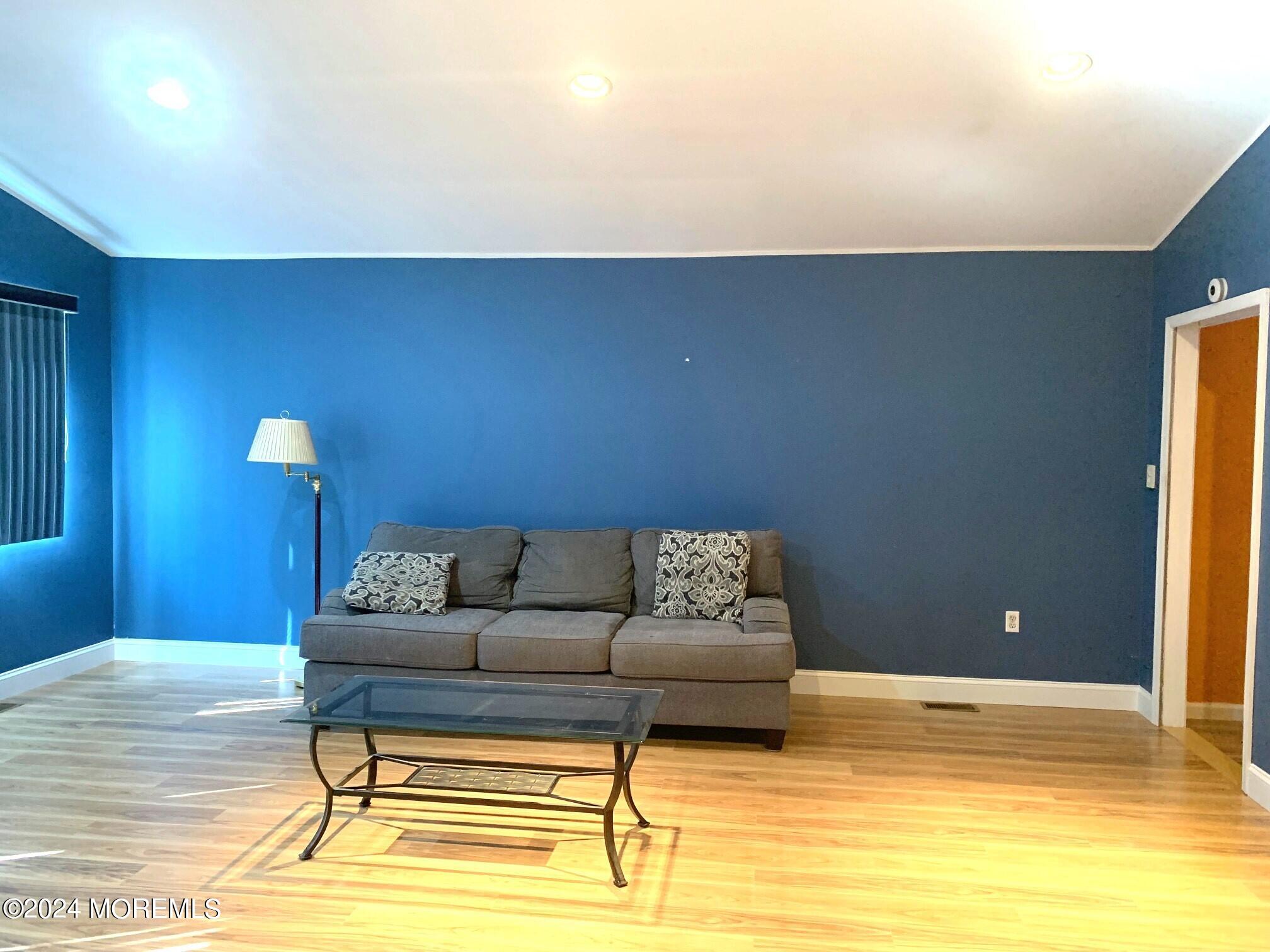 696 Wright Debow Road Jackson, NJ 08527 - Photo 10 of 31 a living room with a couch and a view of living room