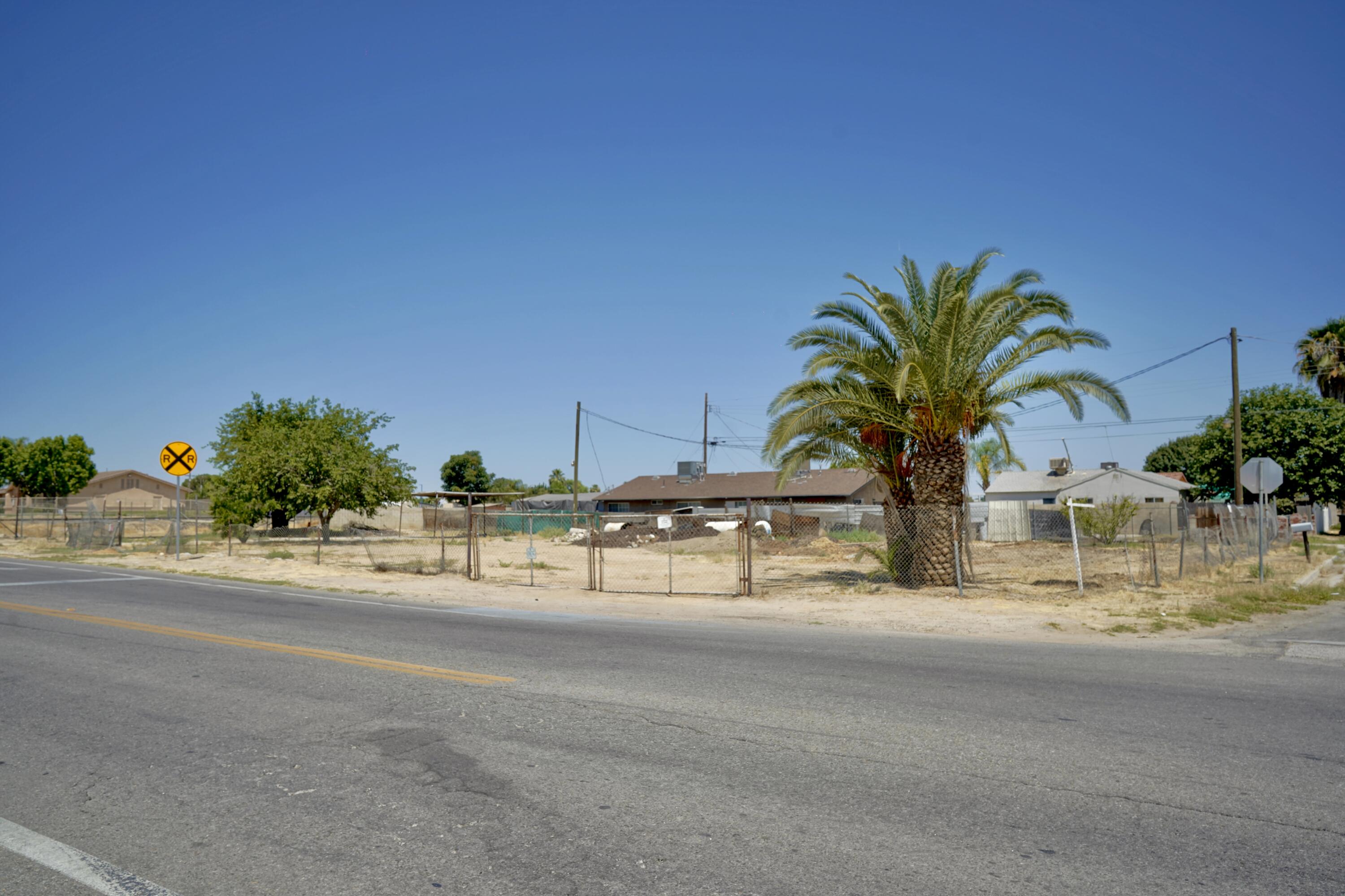 326 Wilson Road Bakersfield, CA 93307 - Photo 10 of 26 a view of a swimming pool and an outdoor space