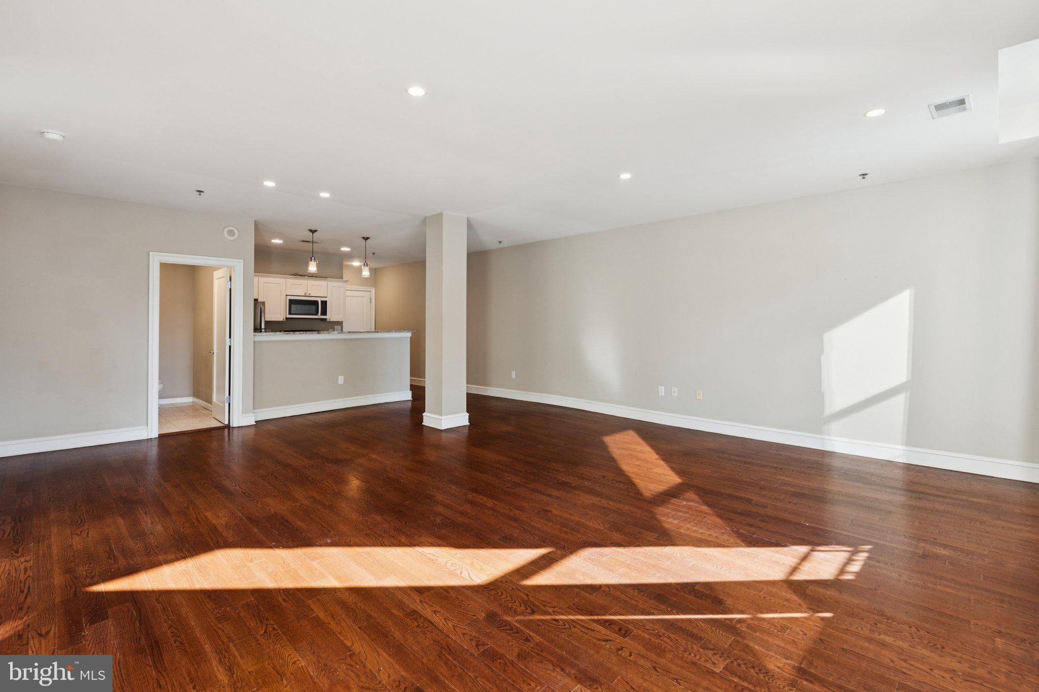 1811 Chestnut Street, Unit 701 Philadelphia, PA 19103 - Photo 11 of 26 a view of a kitchen with a sink and an oven