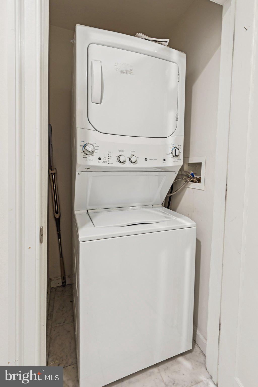 1811 Chestnut Street, Unit 701 Philadelphia, PA 19103 - Photo 22 of 26 a utility room with dryer and washer