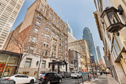 a view of a building with a street