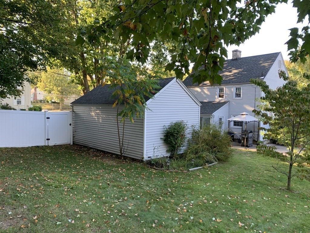 547 Plumtree Road Springfield, MA 01118 - Photo 5 of 21 a view of a house with a yard