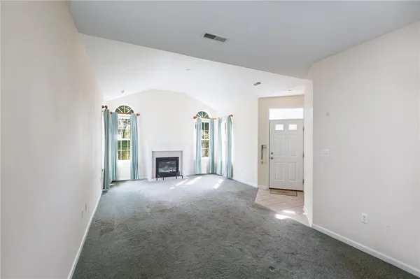 a view of a livingroom with a fireplace