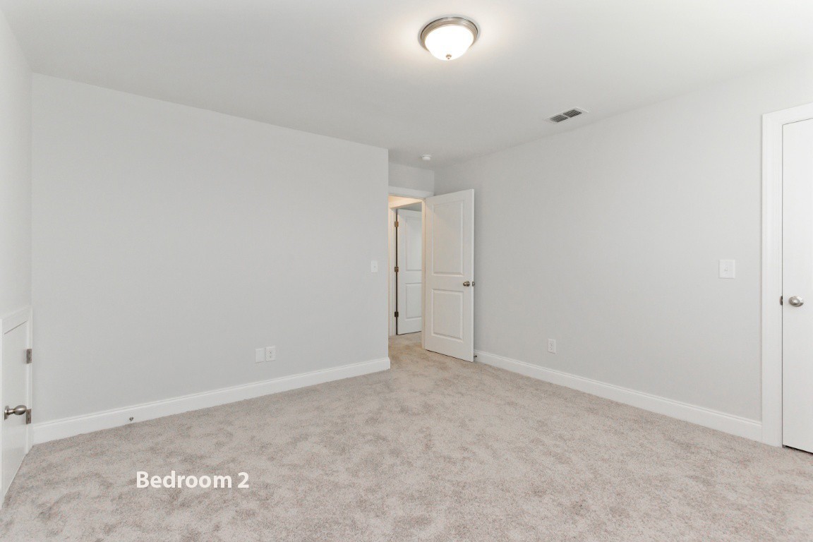 626 Castle Road Mount Juliet, TN 37122 - Photo 14 of 29 an empty room with an entryway