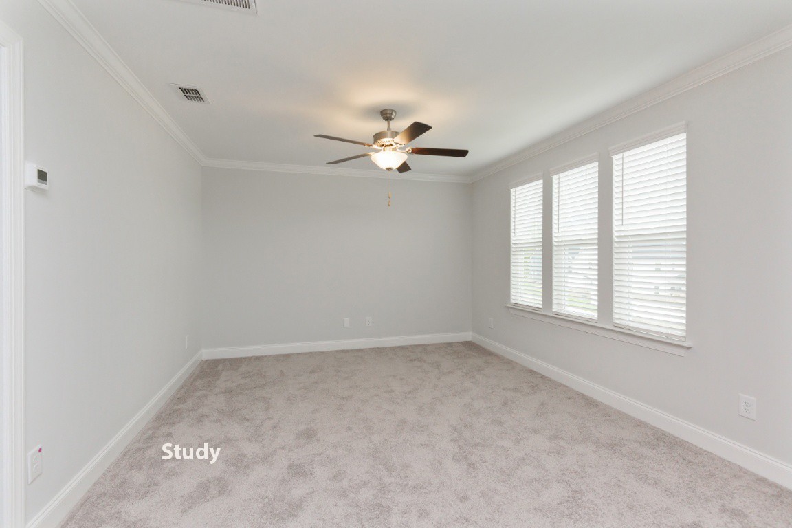 626 Castle Road Mount Juliet, TN 37122 - Photo 20 of 29 an empty room with a window and a ceiling fan