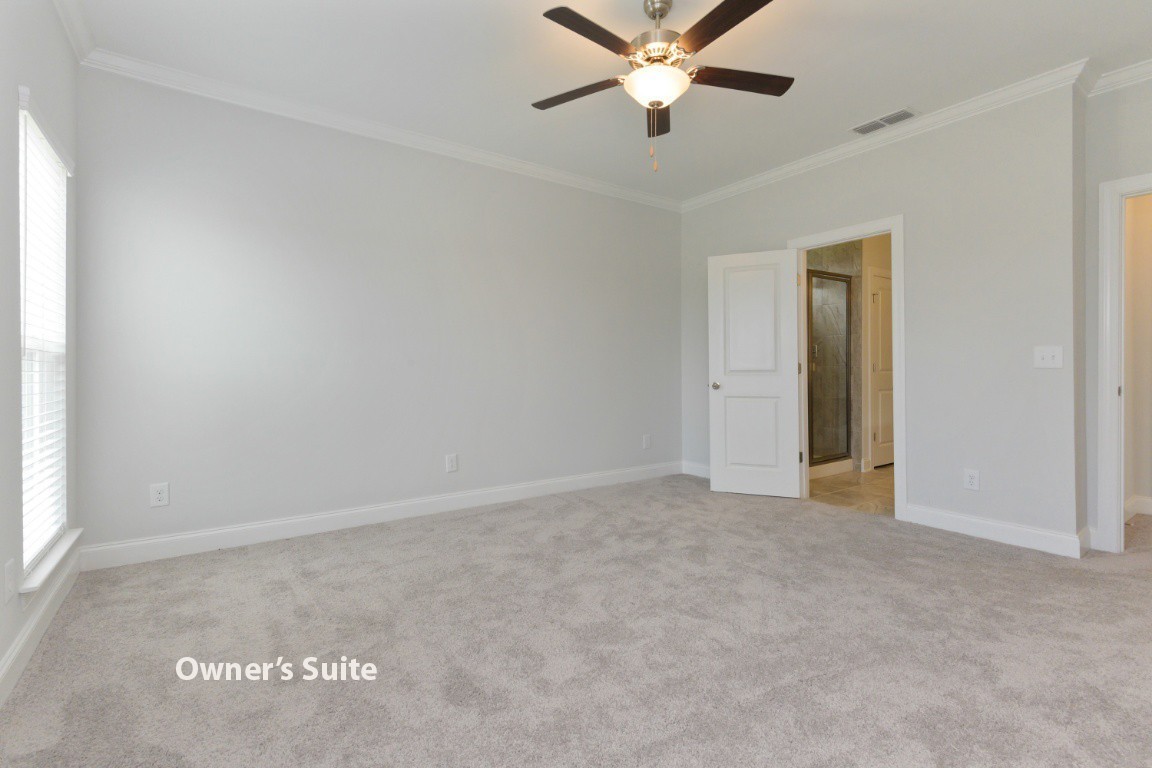 626 Castle Road Mount Juliet, TN 37122 - Photo 24 of 29 an empty room with a chandelier fan and windows