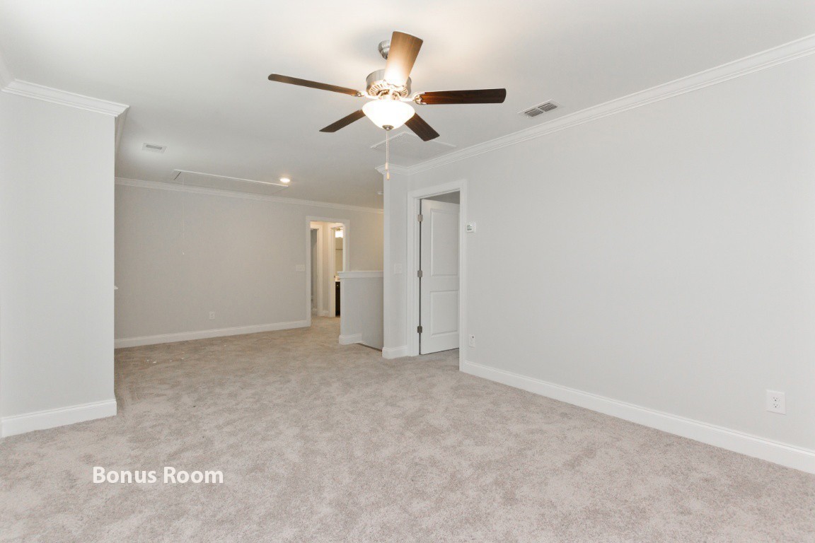 626 Castle Road Mount Juliet, TN 37122 - Photo 28 of 29 an empty room with a ceiling fan and a window