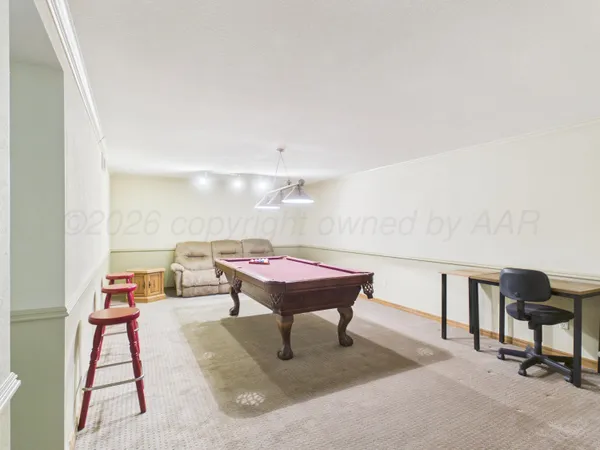 a living room with a couch and a table