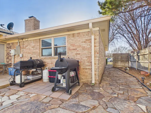 a backyard of a house with seating space