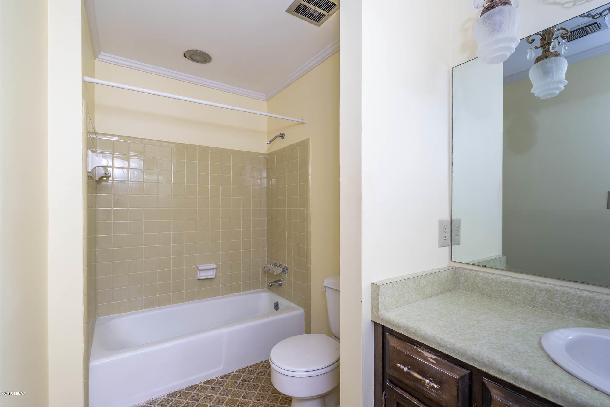 5285 Zebulon Road Macon, GA 31210 - Photo 22 of 37 a bathroom with a granite countertop bathtub shower sink vanity and toilet