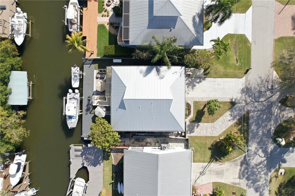 1286 Venetian Way Naples, FL 34110 - Photo 43 of 46 an aerial view of residential houses with outdoor space