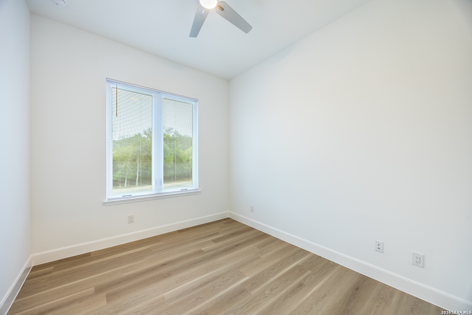 8221 Old Austin Road Selma, TX 78154 - Photo 16 of 28 an empty room with a window