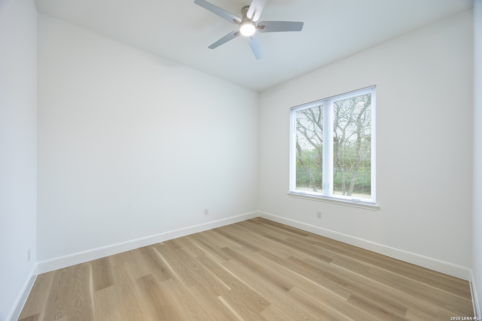 8221 Old Austin Road Selma, TX 78154 - Photo 17 of 28 an empty room with a window