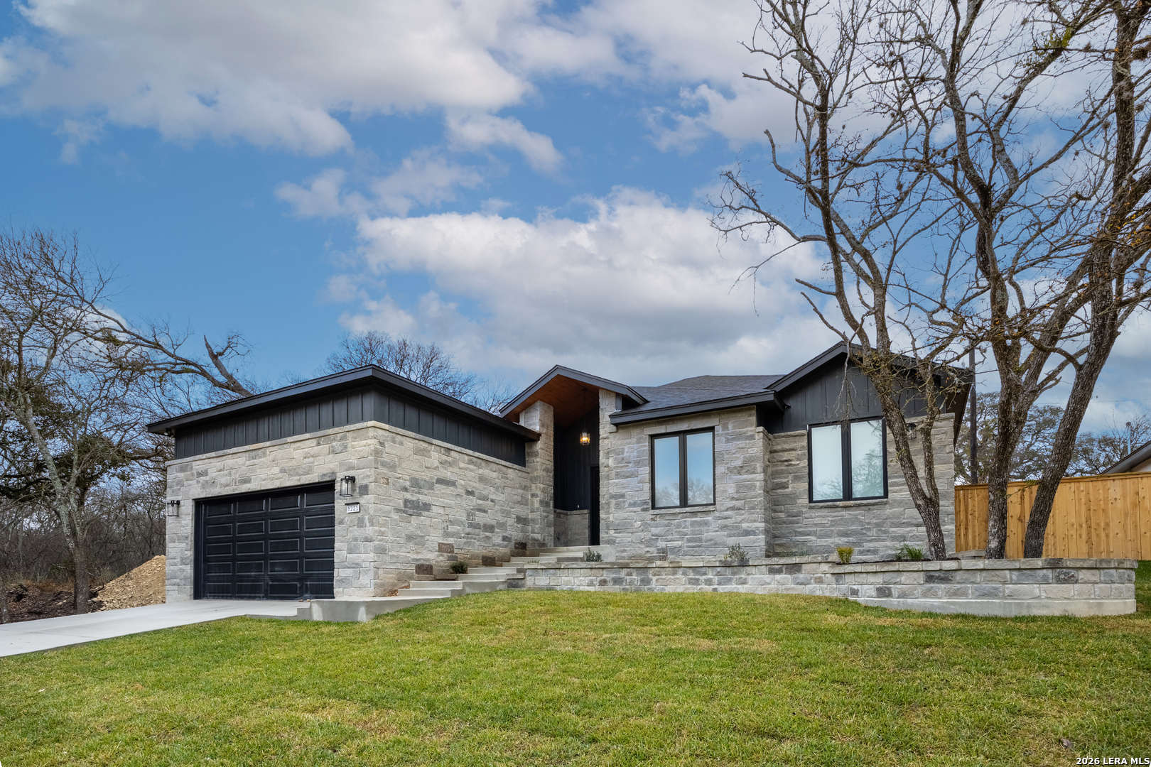 8221 Old Austin Road Selma, TX 78154 - Photo 2 of 28 a front view of a house with a yard