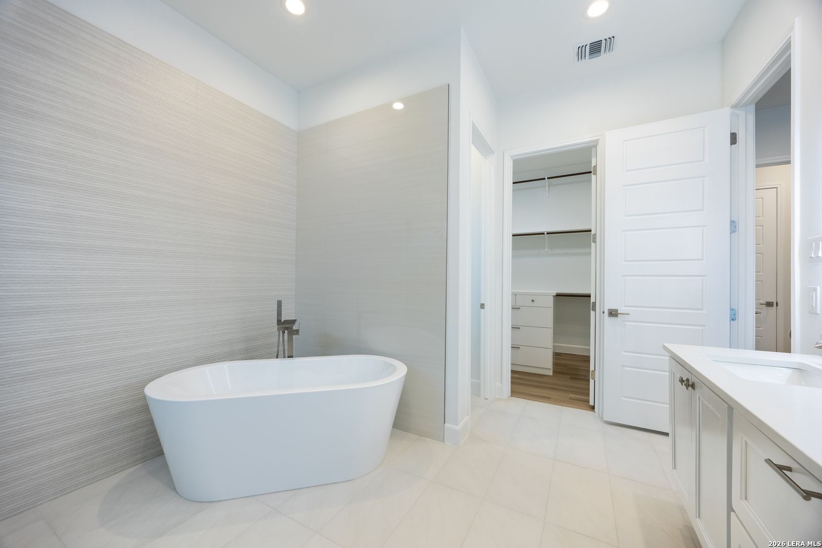 8221 Old Austin Road Selma, TX 78154 - Photo 22 of 28 a bathroom with a bathtub and shower
