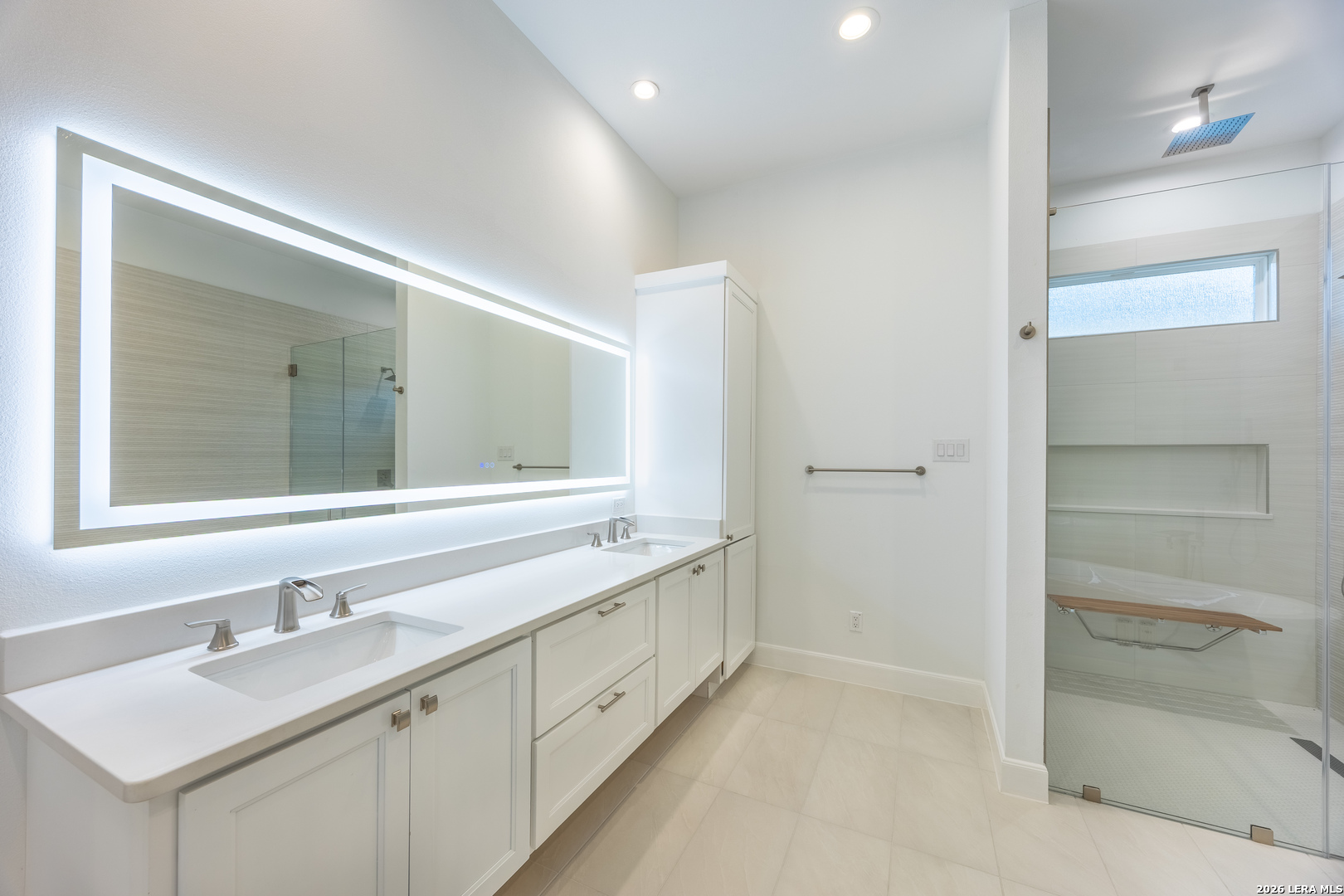 8221 Old Austin Road Selma, TX 78154 - Photo 25 of 28 a bathroom with a sink and a mirror