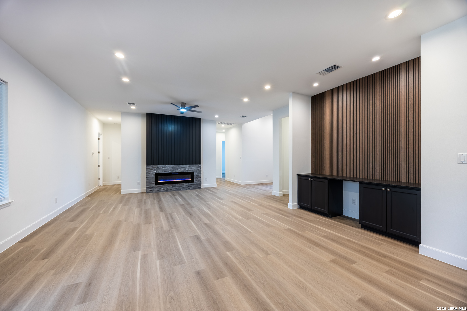 8221 Old Austin Road Selma, TX 78154 - Photo 10 of 28 a view of an empty room with wooden floor