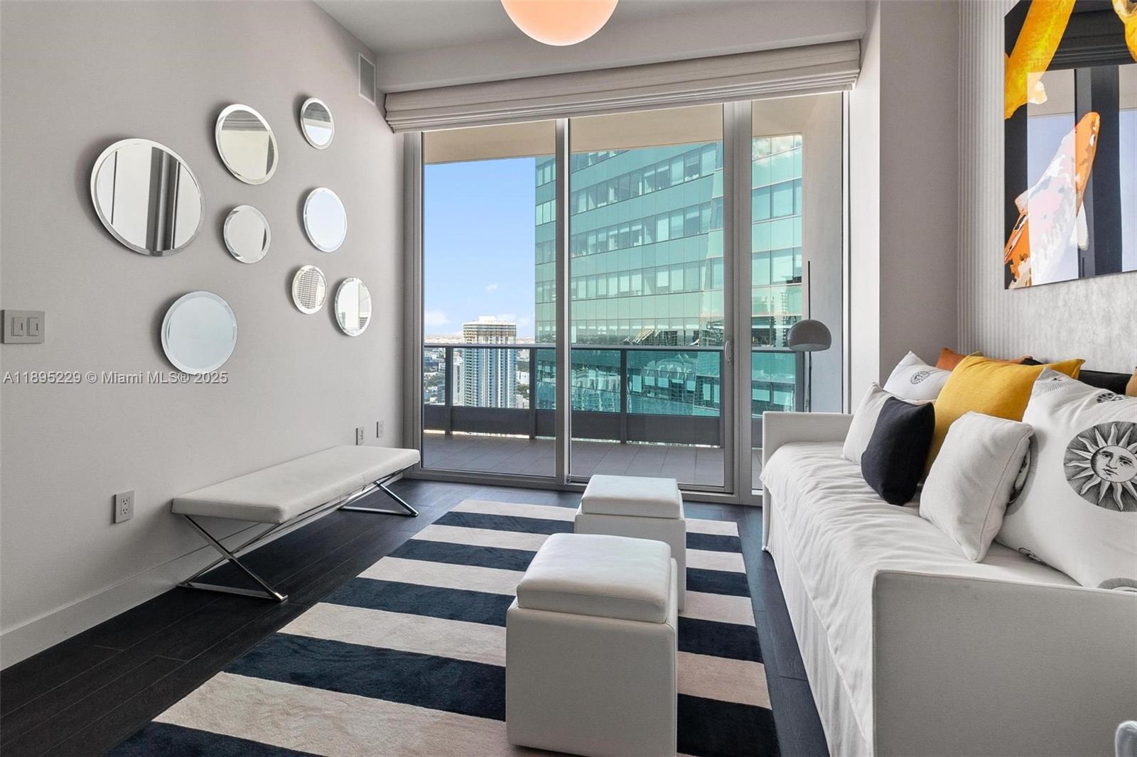 200 Biscayne Blvd Way, Unit 5211 Miami, FL 33131 - Photo 8 of 32 a living room with furniture and a window