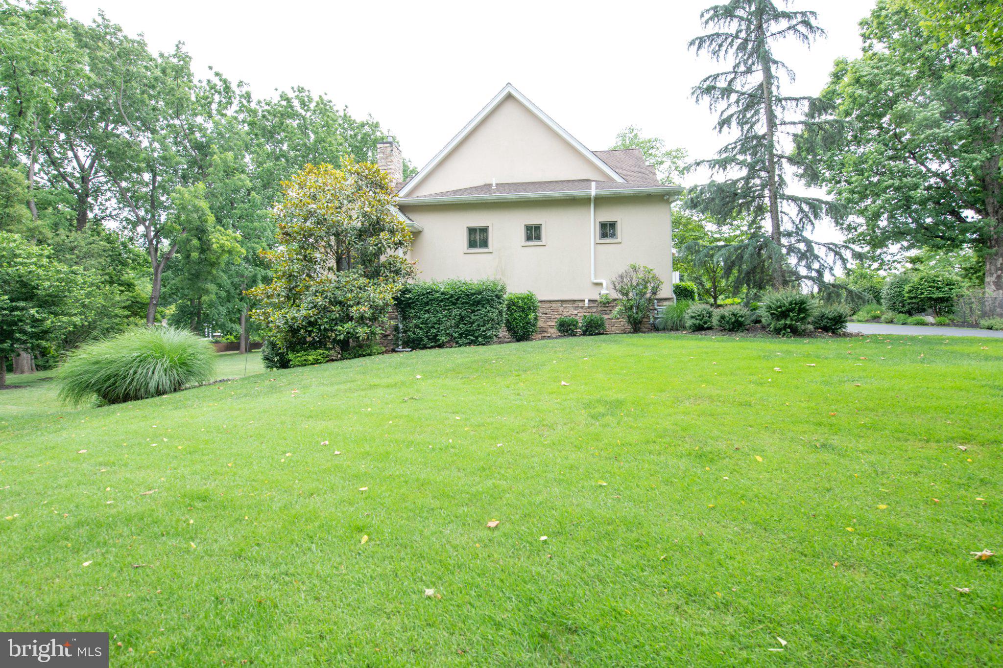 711 Moredon Road Jenkintown, PA 19046 - Photo 12 of 140 Charming home nestled in lush greenery.