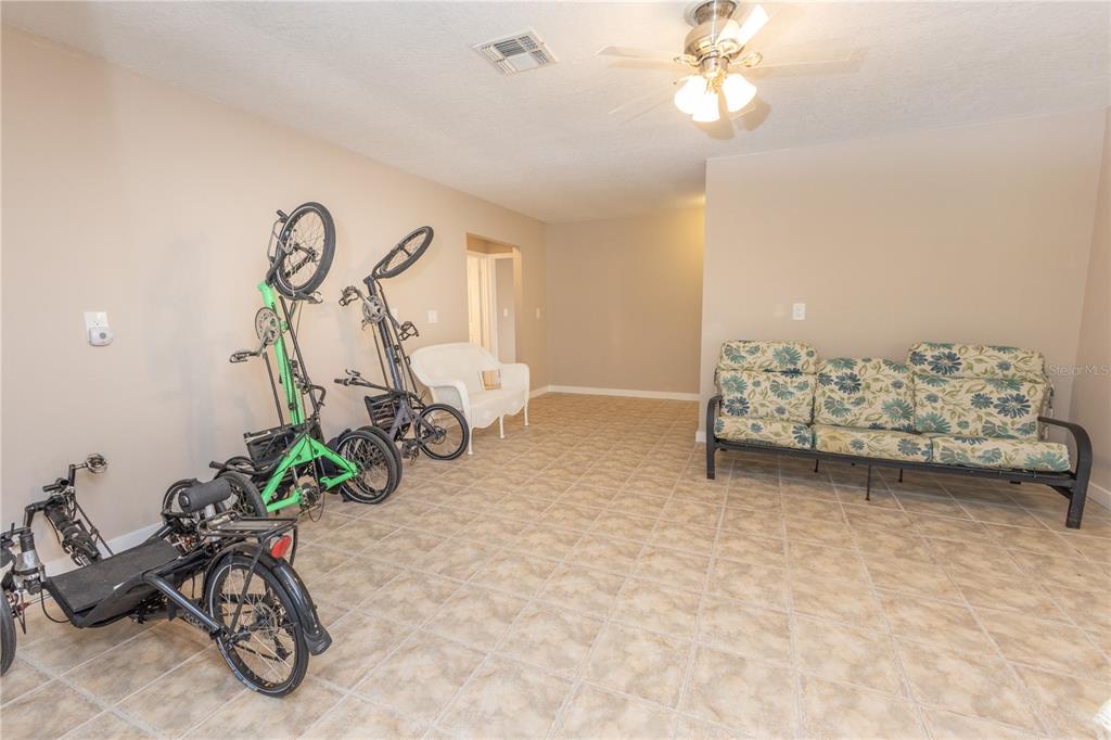 5175 Azalea Circle Dade City, FL 33523 - Photo 13 of 34 a view of a room with gym equipment