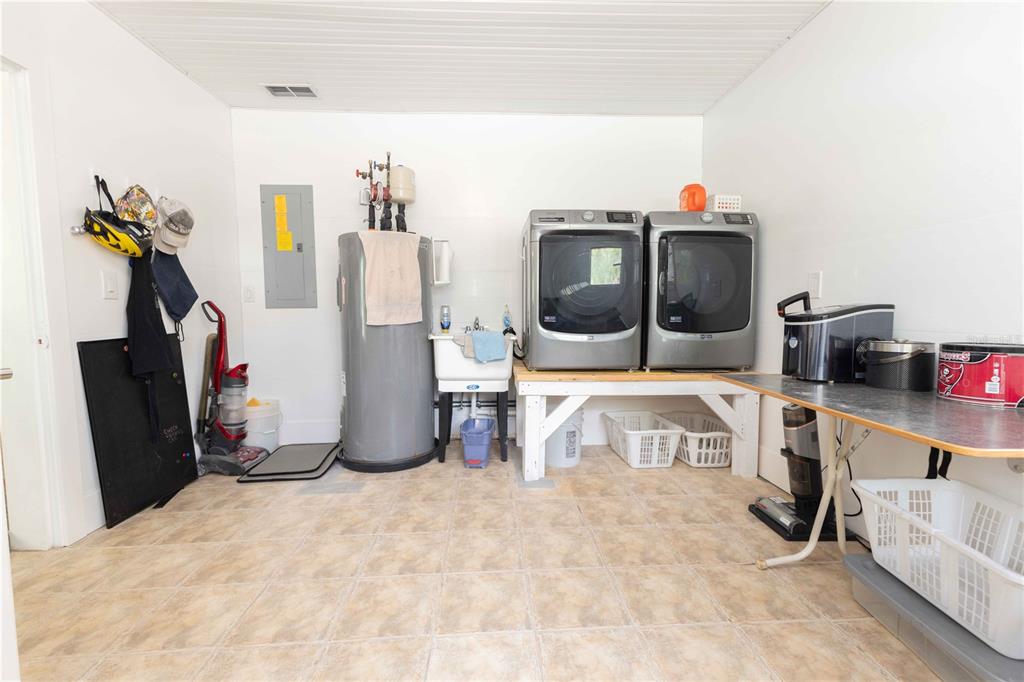 5175 Azalea Circle Dade City, FL 33523 - Photo 16 of 34 a view of a storage & utility room