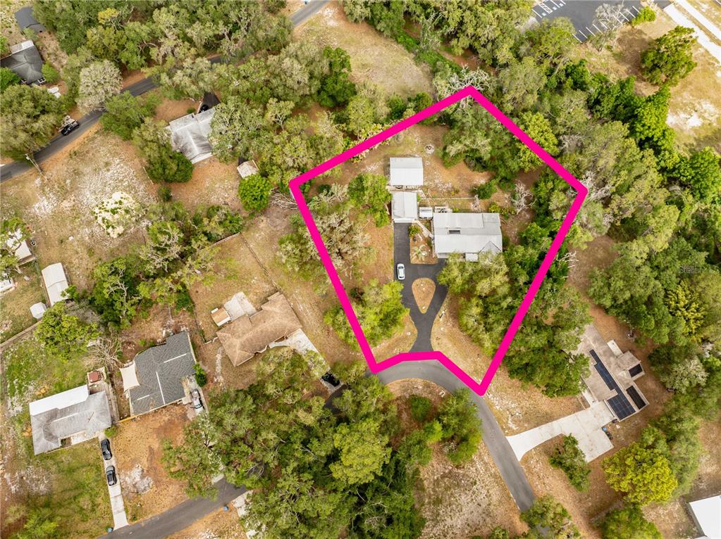 5175 Azalea Circle Dade City, FL 33523 - Photo 30 of 34 a view of a multi story building