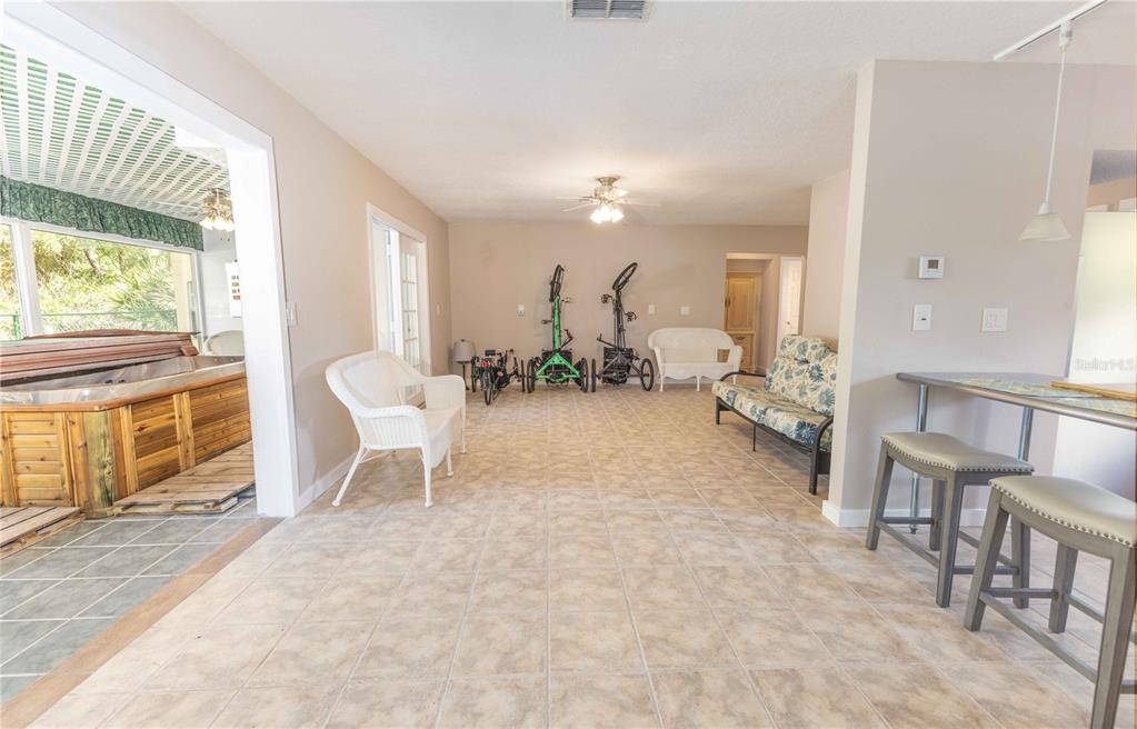 5175 Azalea Circle Dade City, FL 33523 - Photo 5 of 34 a dining room with furniture and a large window