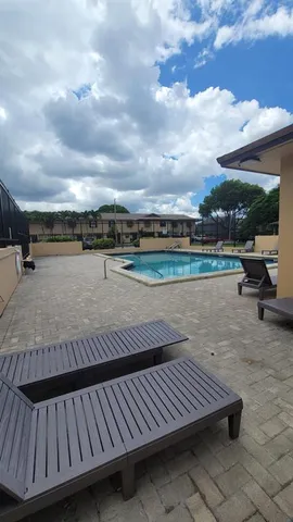 a childrens park with lots of swings and slides