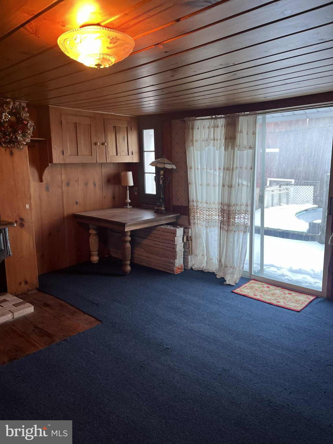 4164 Penns Valley Road Spring Mills, PA 16875 - Photo 11 of 34 a room with wooden floor and furniture