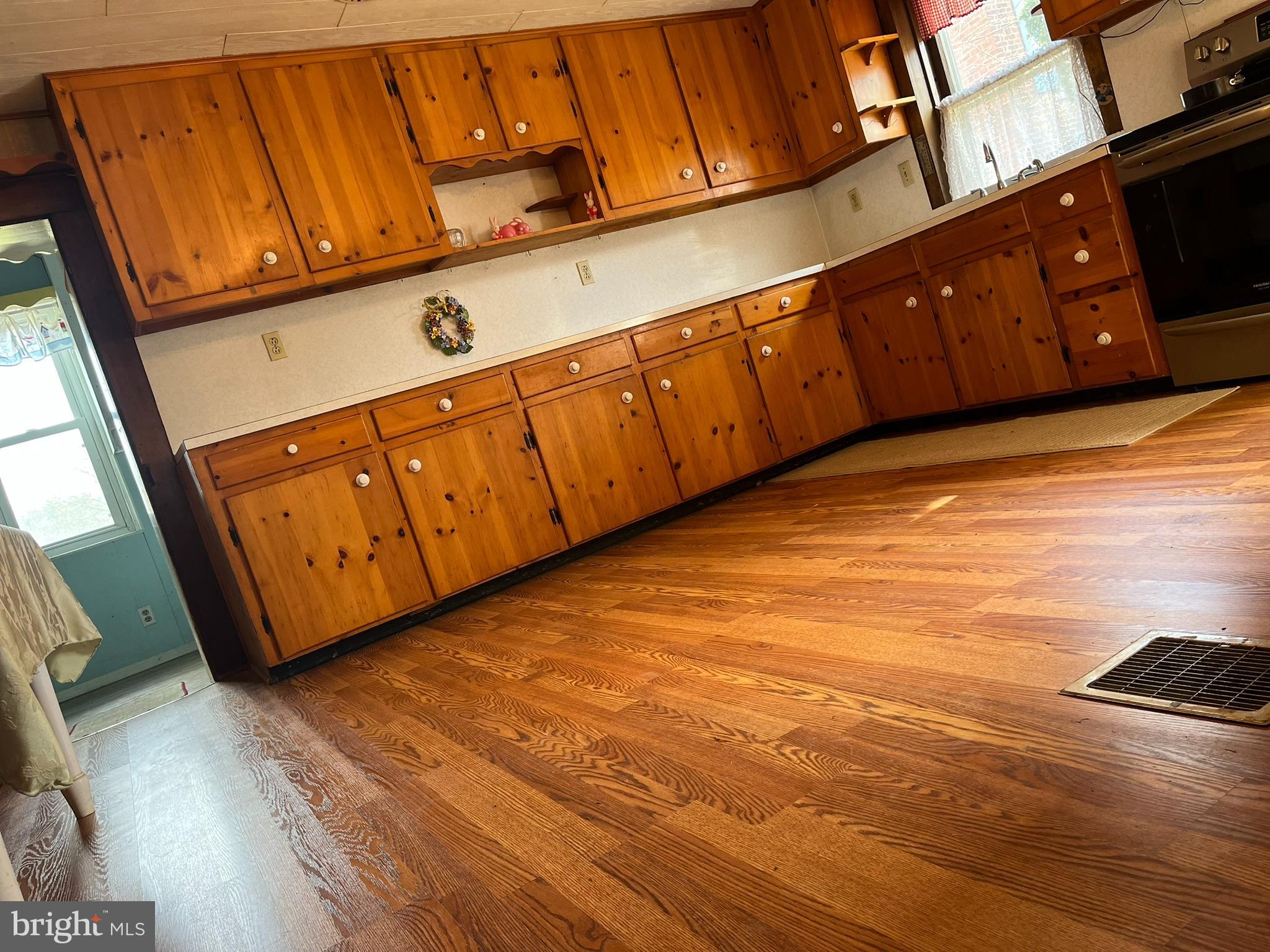 4164 Penns Valley Road Spring Mills, PA 16875 - Photo 14 of 49 a view of a room with wooden floor
