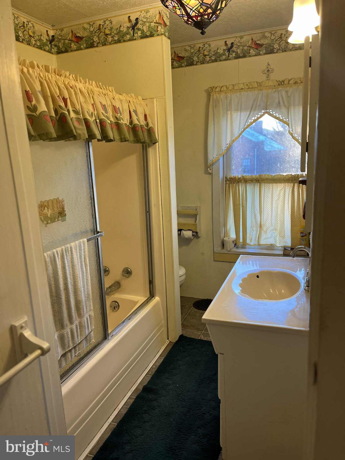 4164 Penns Valley Road Spring Mills, PA 16875 - Photo 20 of 34 a bathroom with a tub and a shower