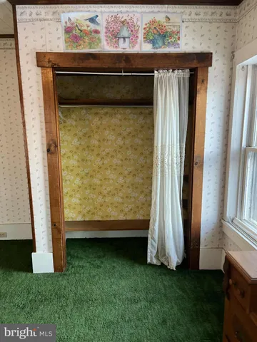 a view of front door and porch