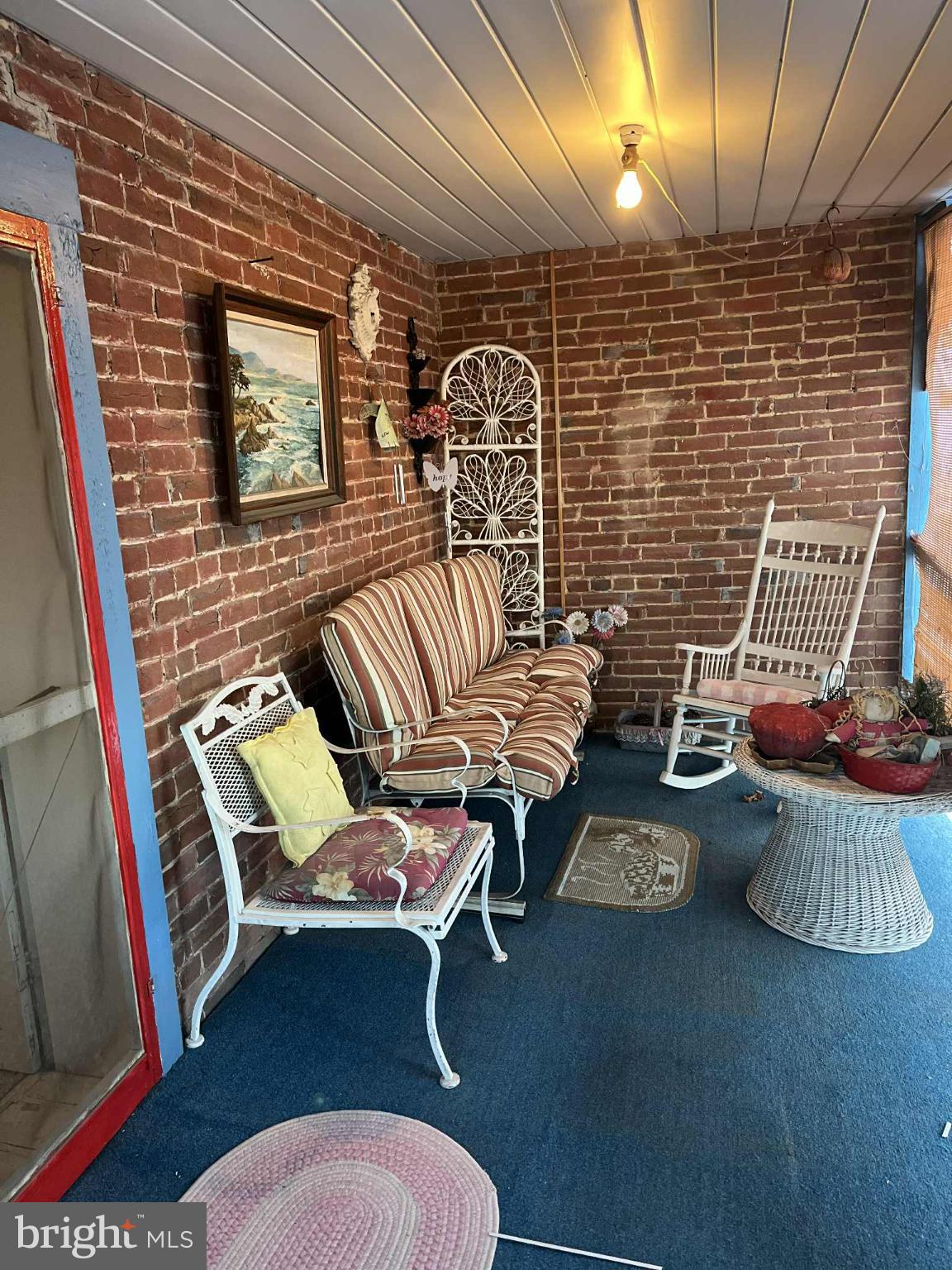 4164 Penns Valley Road Spring Mills, PA 16875 - Photo 25 of 34 a outdoor living space with furniture and a fireplace