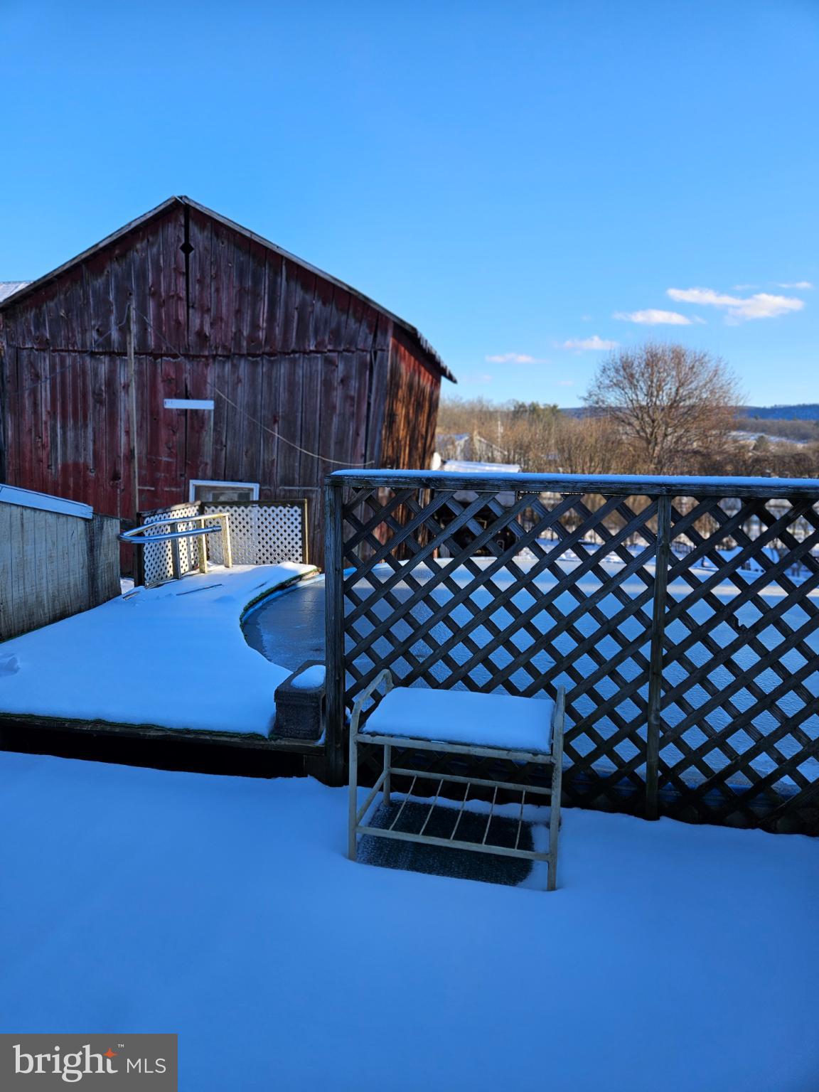 4164 Penns Valley Road Spring Mills, PA 16875 - Photo 34 of 34 a car parked on the side of a building