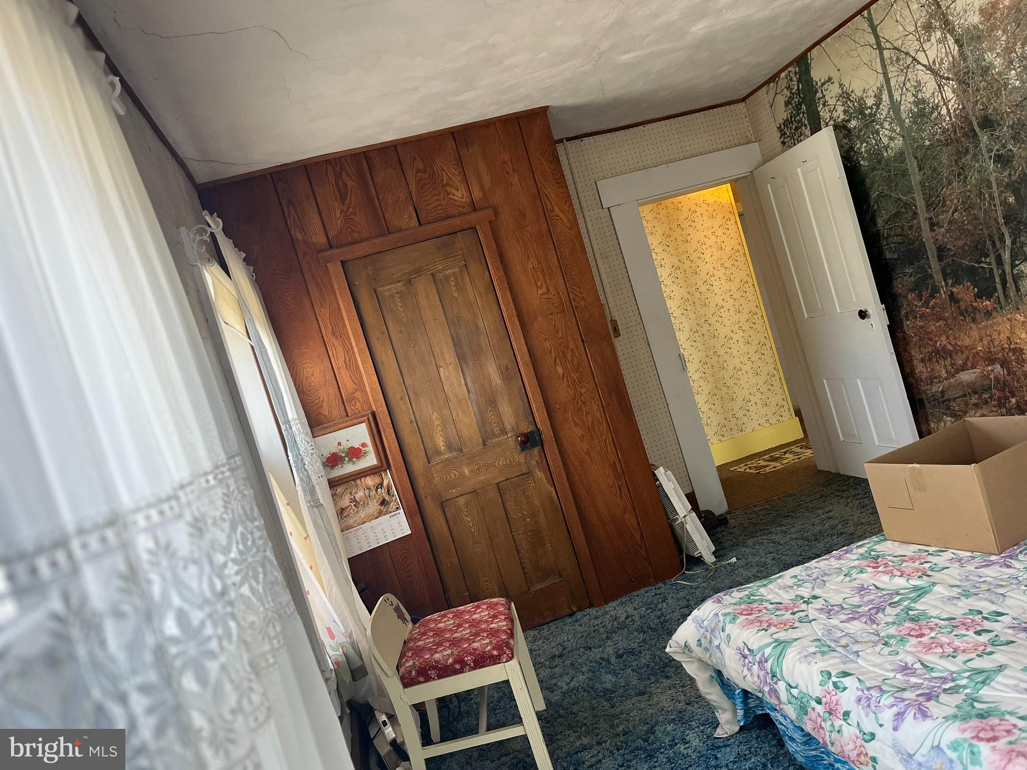 4164 Penns Valley Road Spring Mills, PA 16875 - Photo 37 of 49 a bedroom with a bed and a window