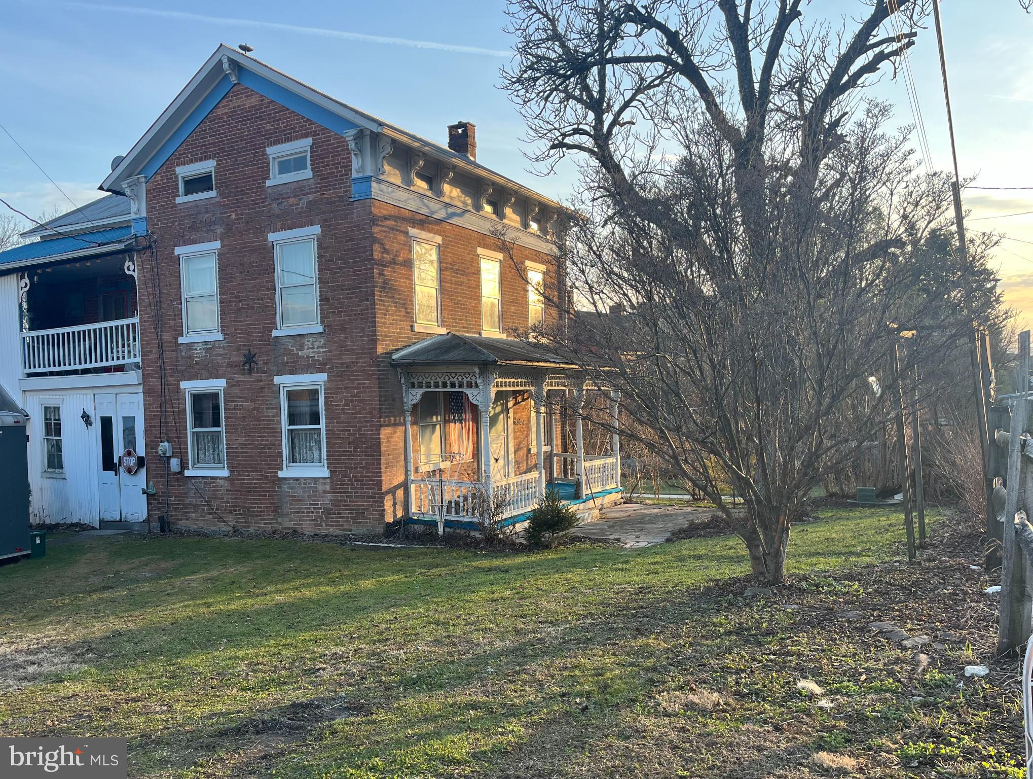 4164 Penns Valley Road Spring Mills, PA 16875 - Photo 4 of 49 a front view of a house with a garden