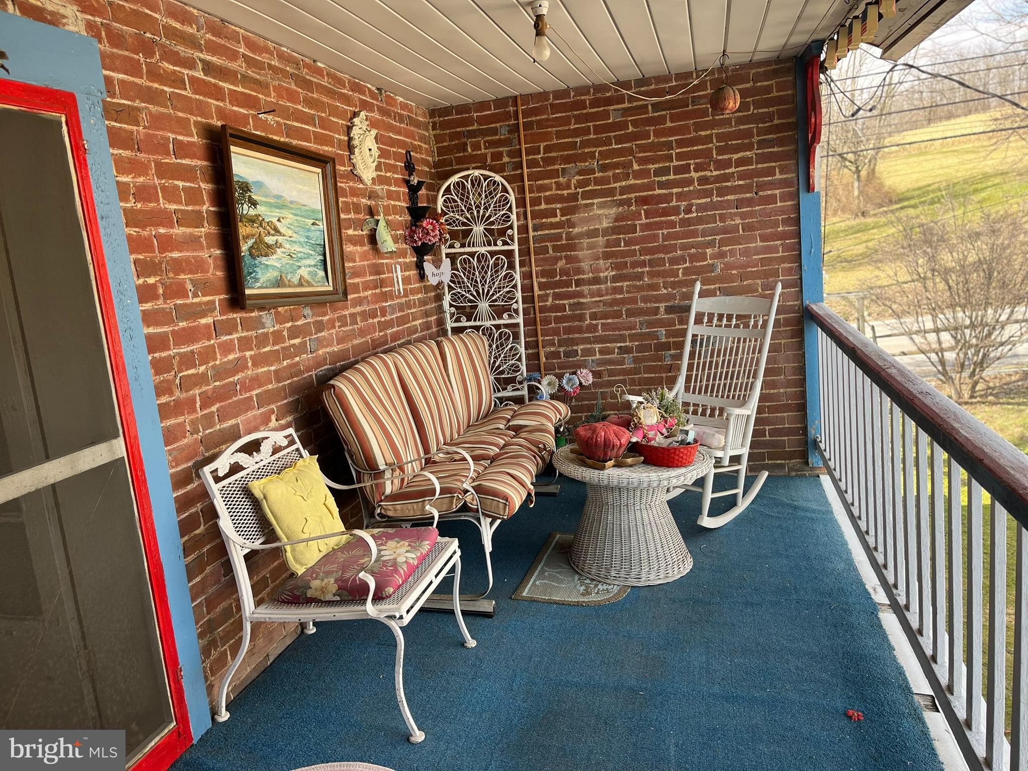 4164 Penns Valley Road Spring Mills, PA 16875 - Photo 41 of 49 a view of a chairs and table in the balcony