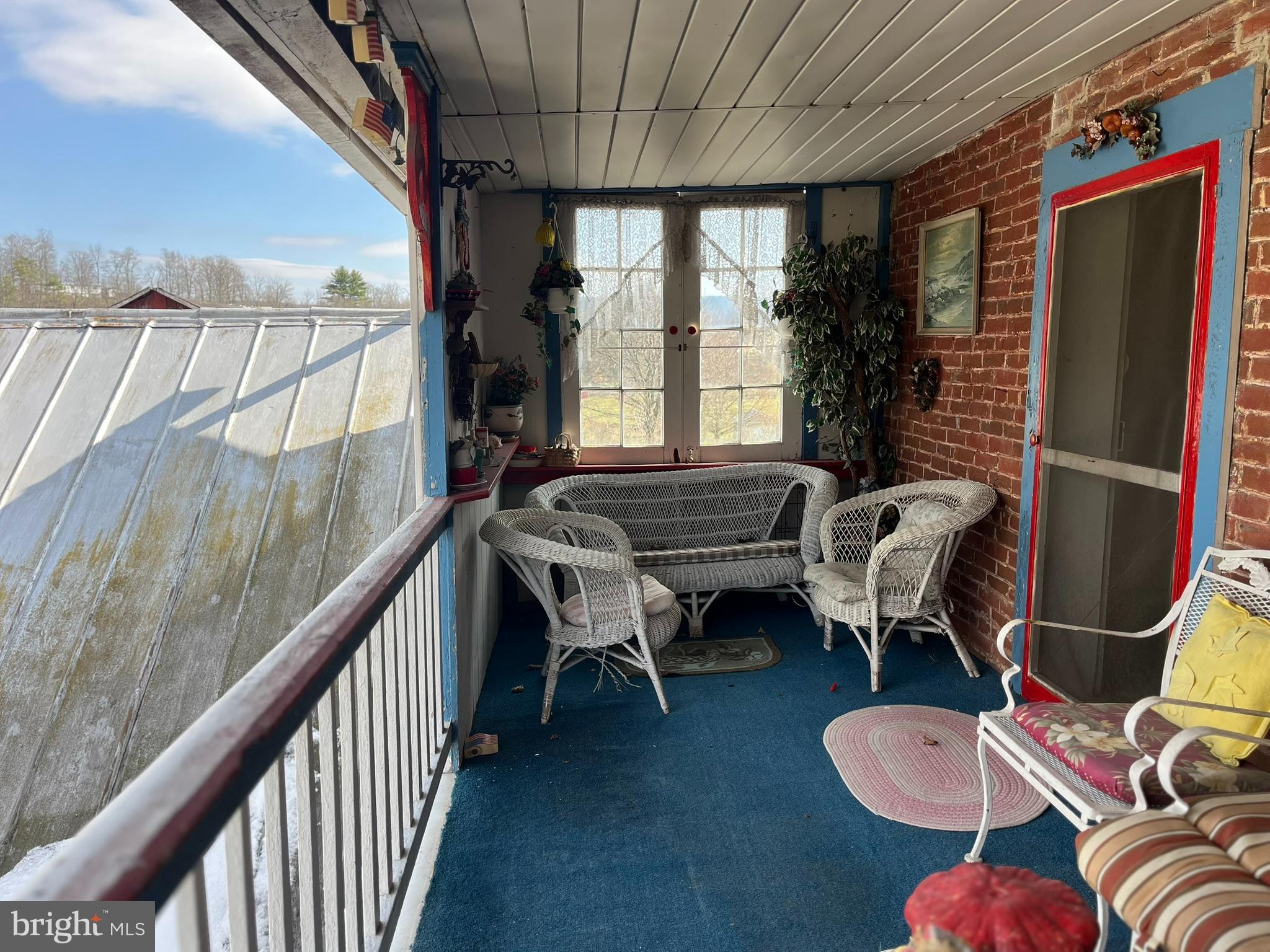 4164 Penns Valley Road Spring Mills, PA 16875 - Photo 42 of 49 a balcony with furniture