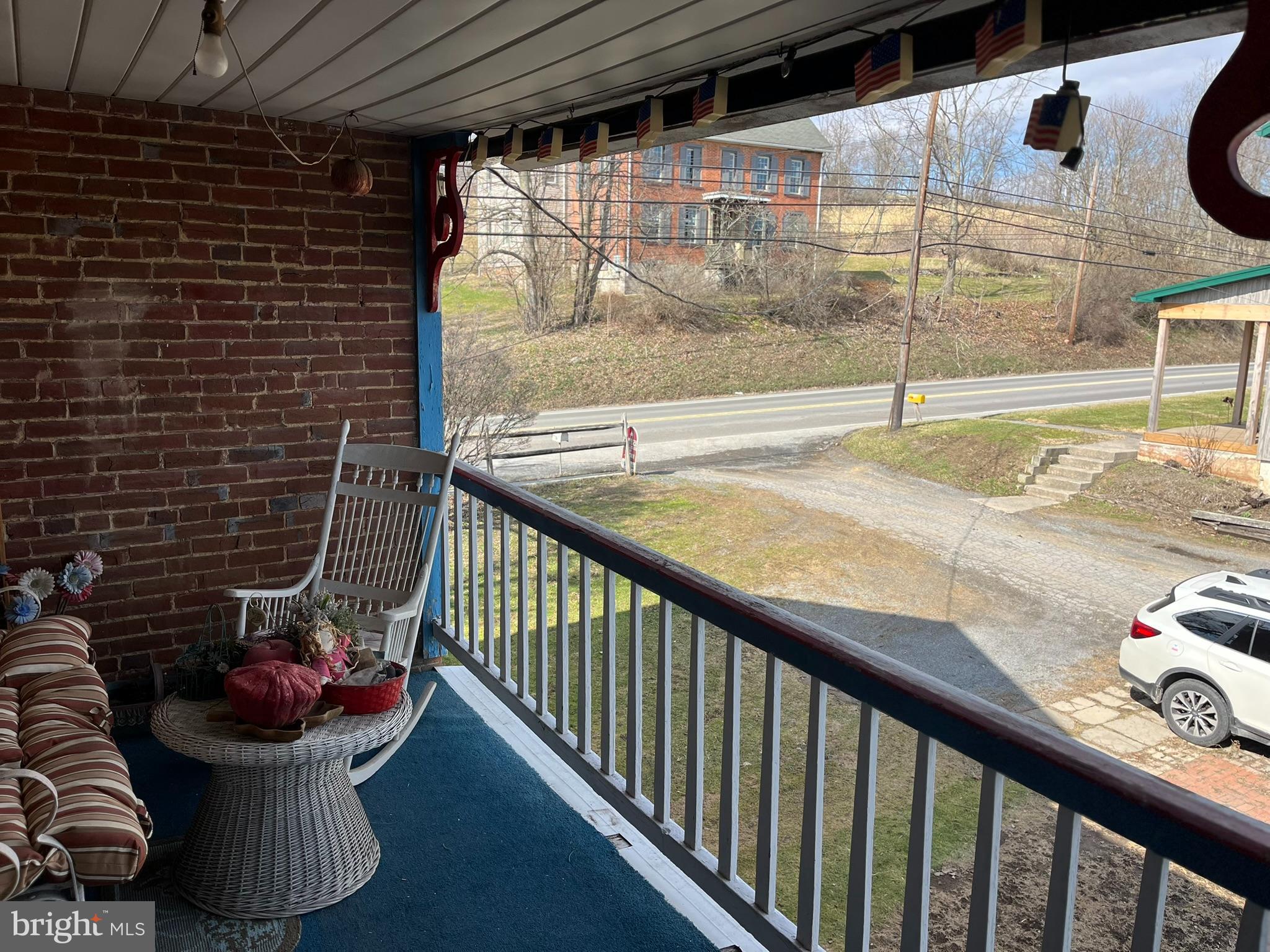 4164 Penns Valley Road Spring Mills, PA 16875 - Photo 43 of 49 a view of a porch with a patio