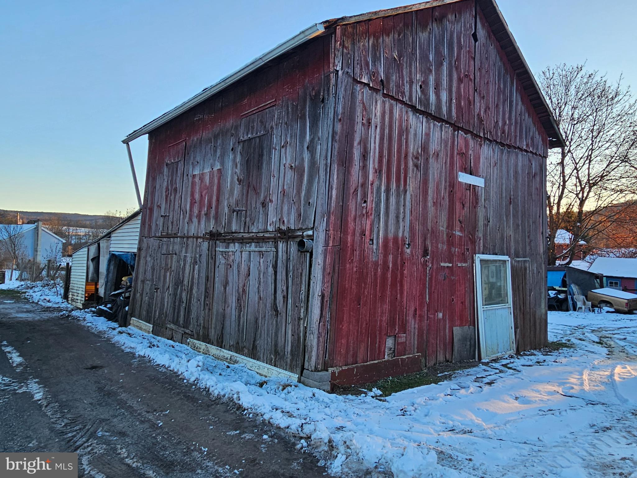 4164 Penns Valley Road Spring Mills, PA 16875 - Photo 46 of 49 a view of a house with a backyard