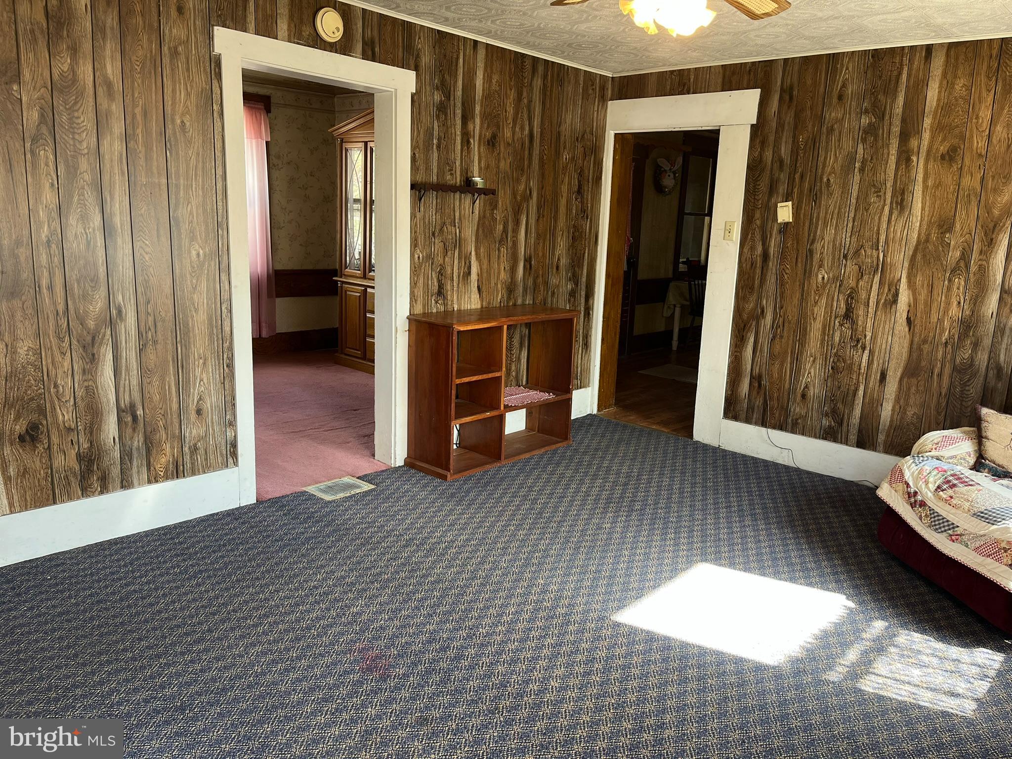 4164 Penns Valley Road Spring Mills, PA 16875 - Photo 7 of 49 a view of a livingroom with furniture and an entryway door