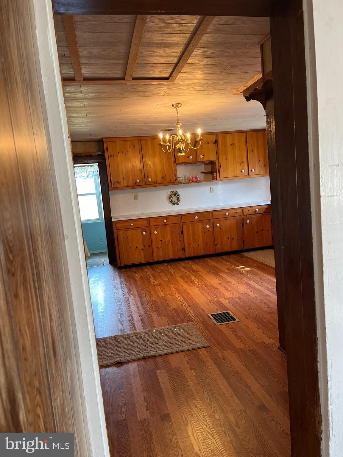 4164 Penns Valley Road Spring Mills, PA 16875 - Photo 9 of 49 a view of a room with wooden floor